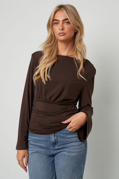 Shirt fitted with flared sleeves